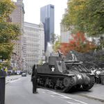 July 22, 1943. Park Row. An M-7 tank destroyer rolls up Park Row in front of City Hall en route to 5th Avenue library, where it was placed on display.